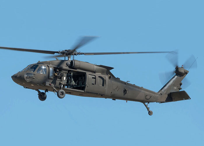 Black Hawk helicopter in flight against a clear sky, related to a secret drill before DC plane crash.