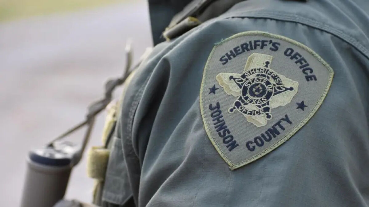 Sheriffu2019s Office uniform patch in Johnson County Texas representing dystopian surveillance tracking abortion care efforts.
