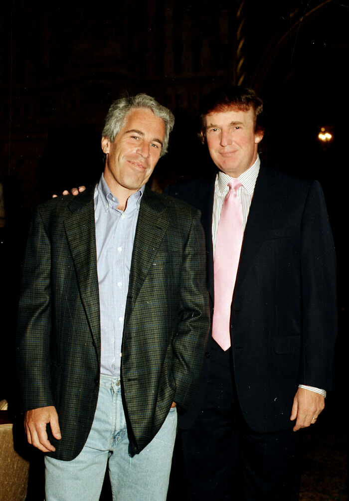 Jeffrey Epstein and Donald Trump posing together at an event, related to Trump Melania Lolita Express audio.