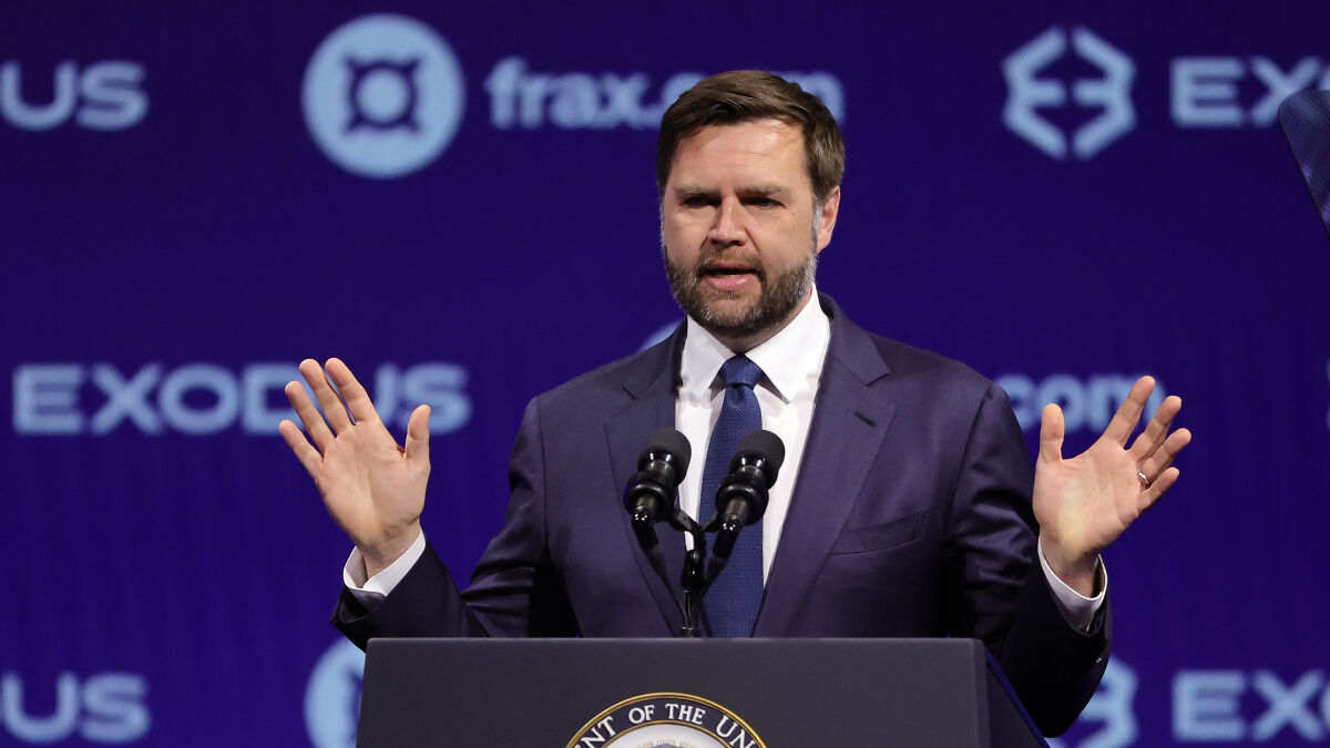 Vice President JD Vance speaking at a podium with hands raised, background displaying Exodus and Frax logos.