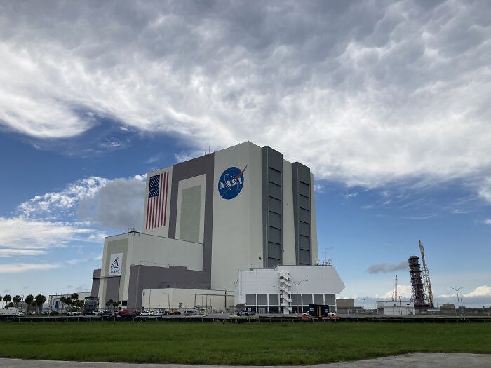 NASA building with American flag under a cloudy sky, associated with MTV reality star and Trump’s new NASA boss news.